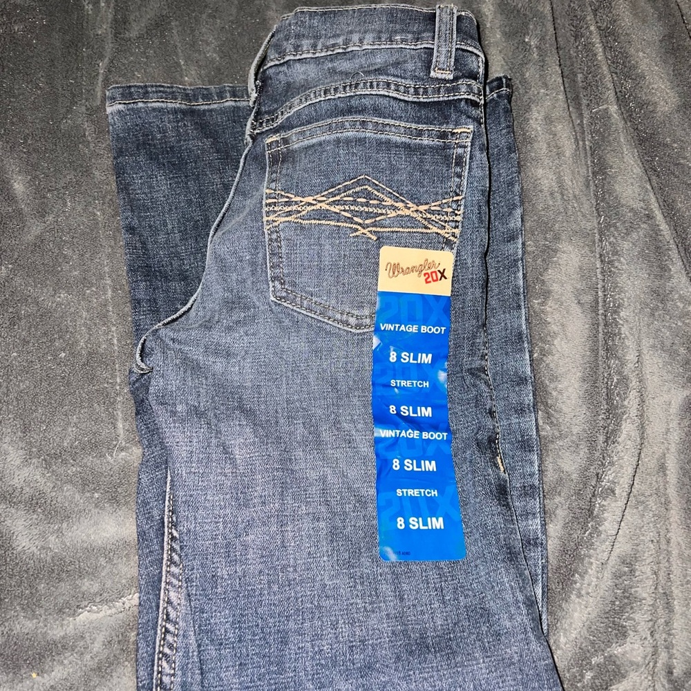 8 slim vintage boot cut wranglers